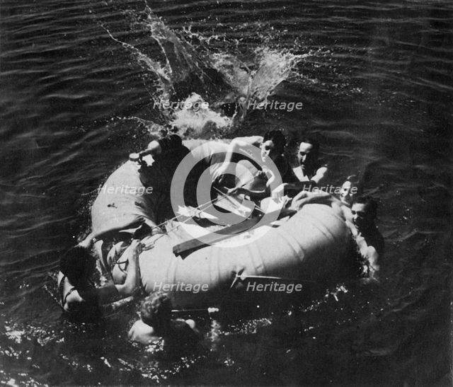 RAF personnel learning to use a dinghy, 1941.  Creator: Charles Brown.