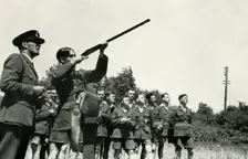 RAF personnel learning to fire guns during the Second World War, 1941. Creator: Charles Brown
