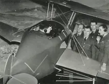 RAF personnel learning to fly in a flight simulator during the Second World War, 1941. Creator: Charles Brown