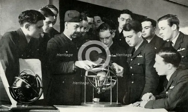 RAF personnel learning navigation during the Second World War, 1941. Creator: Charles Brown.