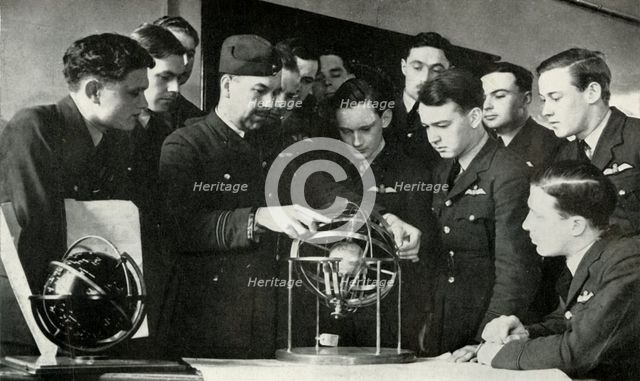 RAF personnel learning navigation during the Second World War, 1941. Creator: Charles Brown.