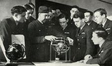 RAF personnel learning navigation during the Second World War, 1941. Creator: Charles Brown