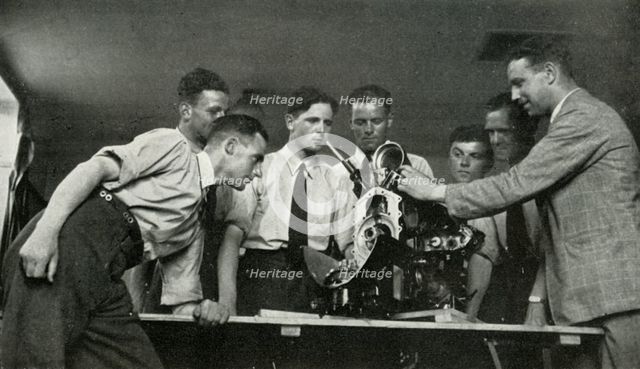 RAF personnel receiving aero-engine instruction, 1941. Creator: Charles Brown.