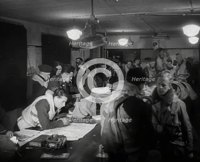 RAF Pilots Planning and Chatting to Each Other, 1942. Creator: British Pathe Ltd.