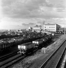 Rail trucks loaded with coal leaving Lynemouth Colliery, Northumberland, 1963. Creator: Michael Walters