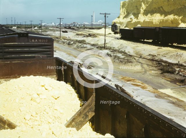 Railroad cars loaded with sulphur, Freeport Sulphur Co., Hoskins Mound, Texas, 1943. Creator: John Vachon.