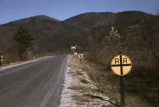 Railroad crossing along the Skyline Drive, Virginia, ca. 1940. Creator: Jack Delano
