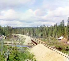 Railroad bridge across Kumsa River near the Medvezhya Gora Station, 1915. Creator: Sergey Mikhaylovich Prokudin-Gorsky