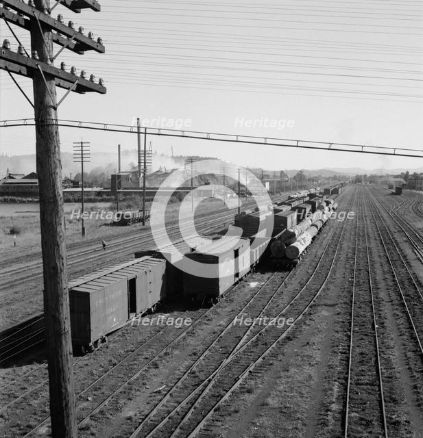 Railroad yard, looking down from highway bridge, Centralia, Lewis County, Washington, 1939. Creator: Dorothea Lange.