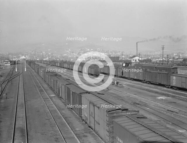 Railroad yard, outskirts of fast-growing town, Klamath Falls, Oregon, 1939. Creator: Dorothea Lange.