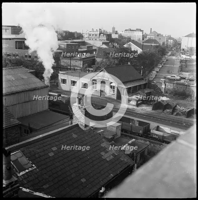 Railway tracks and pay office, 1965-1968. Creator: Eileen Deste.