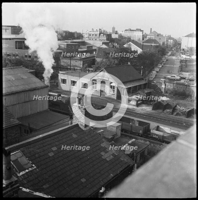 Railway tracks and pay office, 1965-1968. Creator: Eileen Deste.