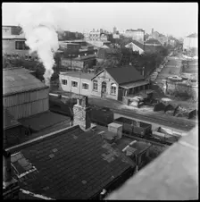 Railway tracks and pay office, 1965-1968. Creator: Eileen Deste
