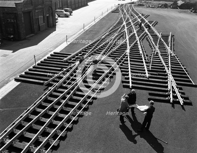 Railway track work at Edgar Allen's steel foundry, Sheffield, South Yorkshire, 1962. Creator: Michael Walters.