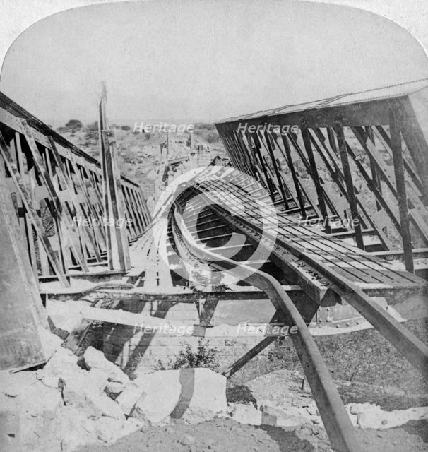 Railway bridge across the Vals River at Kroonstad, blown up by the Boers, South Africa, 1901. Artist: Underwood & Underwood