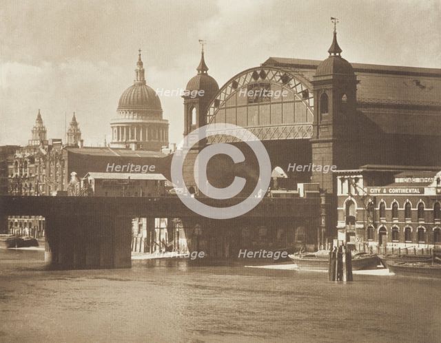 [Railway station and bridge]. From the album: Photograph album - London, 1920s. Creator: Harry Moult.