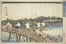 Rain at Nihonbashi Bridge (Nihonbashi no hakuu), from the series "Famous Places in the..., c1832/38. Creator: Ando Hiroshige