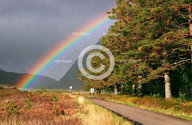 Rainbow over the road from Ullapool to Torridon, Highland, Scotland.
