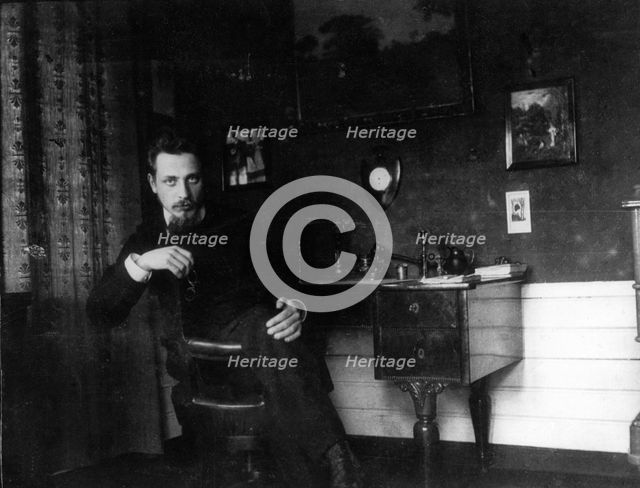 Rainer Maria Rilke in his study, c. 1905. Creator: Anonymous.