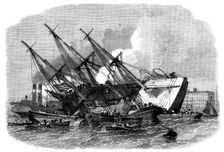 Raising the iron ship Ganges, sunk in the Thames off Shadwell, 1862. Creator: Unknown