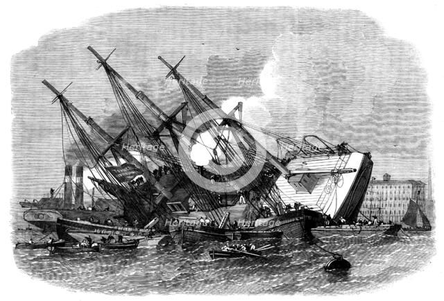 Raising the iron ship Ganges, sunk in the Thames off Shadwell, 1862. Creator: Unknown.