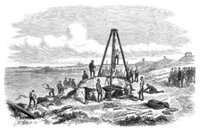 Raising the west capstone of Le Trepied Cromlech, Guernsey, 1870. Creator: Unknown