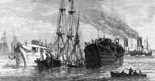 Raising a sunken Indiaman in the Thames, near Gravesend, 1874. Creator: Unknown
