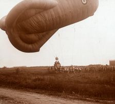 Raising of barrage balloon with basket for observation, c1914-c1918