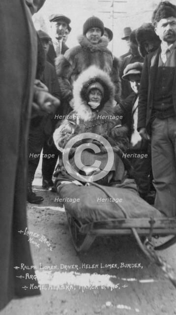 Ralph and Helen Lomen on dog sled, ready for race, 1915. Creator: Lomen Brothers.