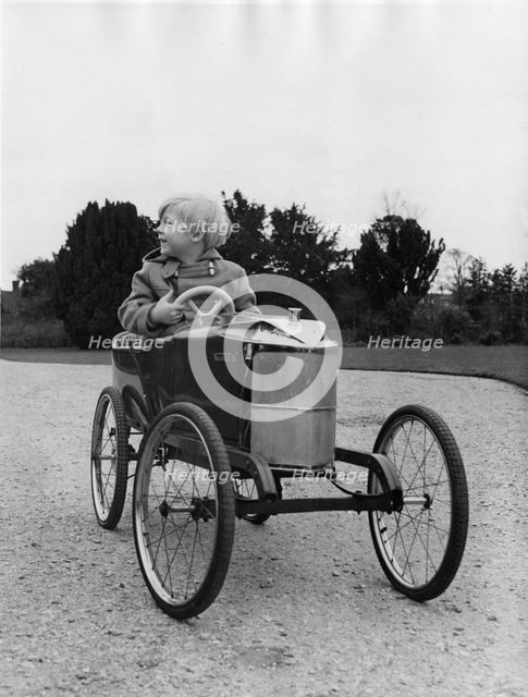 Ralph (Lord) Montagu as a child in Vauxhall pedal car 1966. Creator: Unknown.