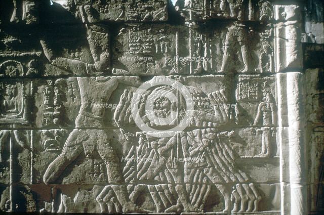 Rameses III smiting his enemies before Amun-Ra, Mortuary Temple, Medinat Habu, Egypt, c12th cen BC Artist: Unknown