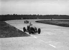 Rapier Special Racing single seater leading a MG in a race on the Campbell Circuit at Brooklands. Artist: Bill Brunell