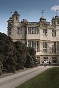 Re-enactor leading a horse towards Audley End House, Saffron Walden, Essex, 2010. Artist: Andrew Shaylor