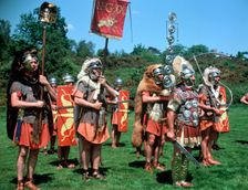 Re-enactors dressed as Roman soldiers. Creator: Peter Thompson