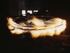 Retiring a locomotive driver wheel, Shopton, Iowa, 1943. Creator: Jack Delano