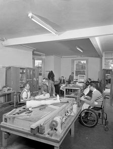 Retraining at a paraplegic centre in Pontefract, West Yorkshire, 1960. Creator: Michael Walters