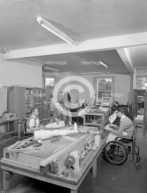 Retraining at a paraplegic centre in Pontefract, West Yorkshire, 1960. Creator: Michael Walters.