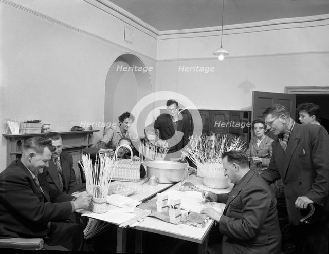 Retraining at a paraplegic centre in Pontefract, West Yorkshire, 1960. Creator: Michael Walters.