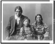 Reuben Black Boy and family, c1910. Creator: Edward Sheriff Curtis