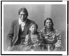 Reuben Black Boy and family, c1910. Creator: Edward Sheriff Curtis