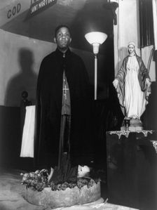 Reverend Vondell Gassaway, pastor of the St. Martin's Spiritual Church..., Washington, D.C., 1942. Creator: Gordon Parks