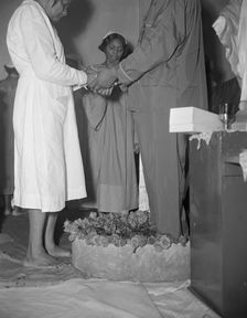 Reverend Vondell Gassaway, pastor of the St. Martin's Spiritual Church..., Washington, D.C., 1942. Creator: Gordon Parks