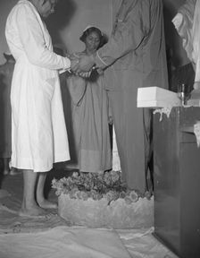 Reverend Vondell Gassaway, pastor of the St. Martin's Spiritual Church..., Washington, D.C., 1942. Creator: Gordon Parks