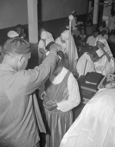 Reverend Vondell Gassway, pastor of the St. Martin's Spiritual Church..., Washington, D.C., 1942. Creator: Gordon Parks