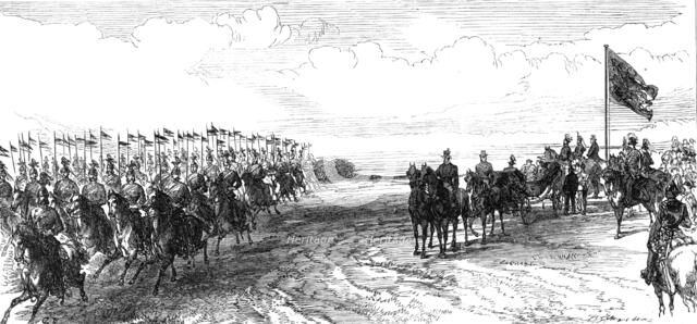 Review in Phoenix Park: the 12th Lancers galloping past, 1868. Creator: C. R..