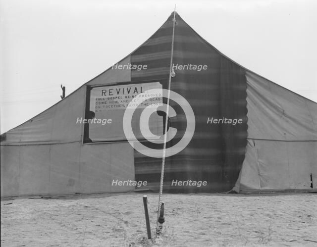 Revival meetings are held in Yakima shacktown, Sumac Park, Yakima, Washington, 1939. Creator: Dorothea Lange.