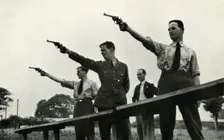 Revolver practice at the Elementary Flying Training School 1941. Creator: Charles Brown