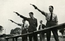 Revolver practice at the Elementary Flying Training School 1941. Creator: Charles Brown