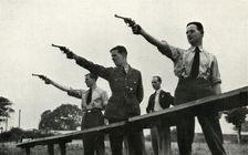 Revolver practice at the Elementary Flying Training School 1941. Creator: Charles Brown