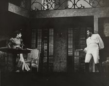 Rex Ingram pointing gun at woman, 1938. Creator: Unknown